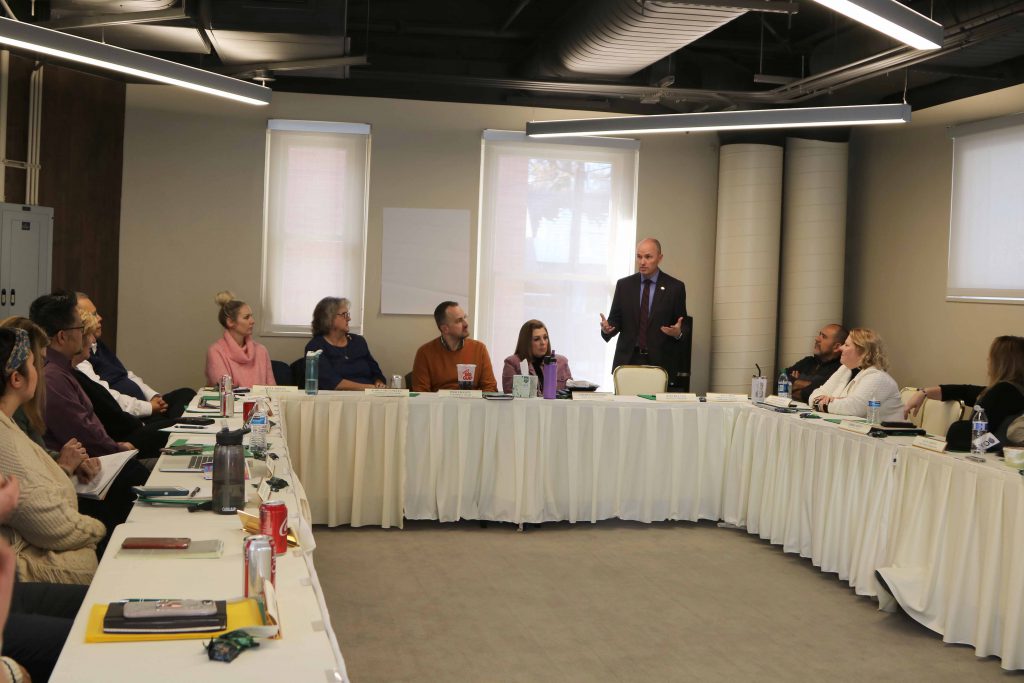 Lt. Governor Spencer Cox speaking to the UServeUtah commissioners during the commission retreat