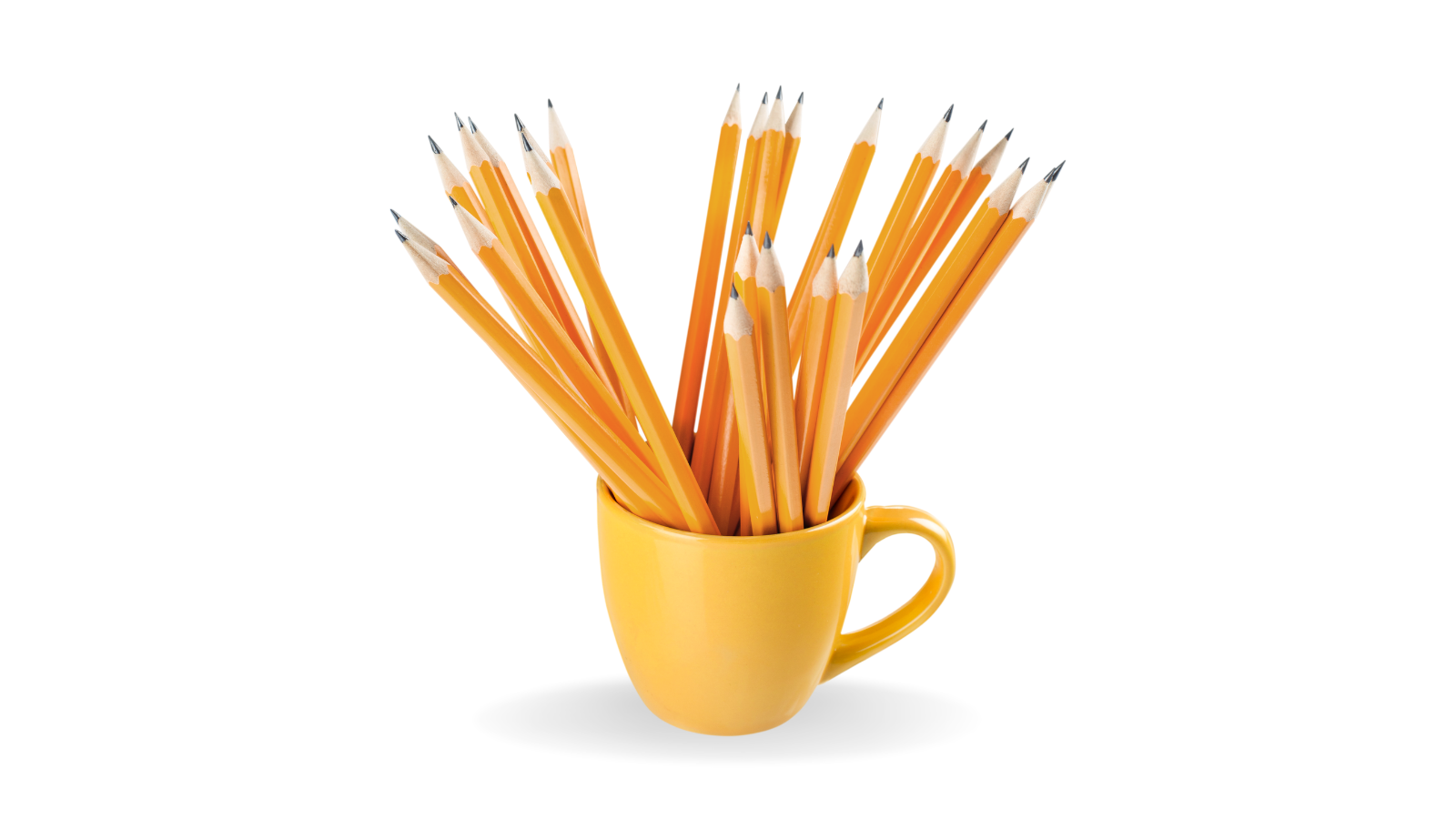 yellow teacup full of pencils